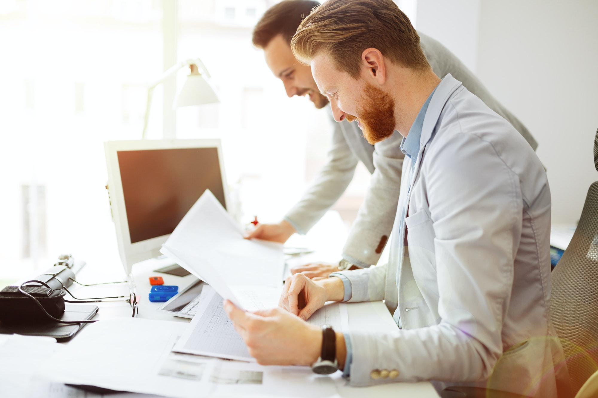 Coworkers planning startup goals